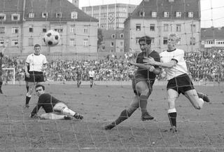 Gerd Muller scores for Bayern Munich against Borussia Neunkirchen in September 1965.