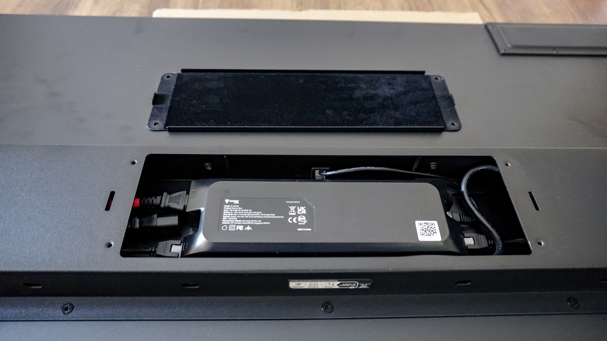 The pre-installed and wired control box inside the Secretlab Magnus Evo