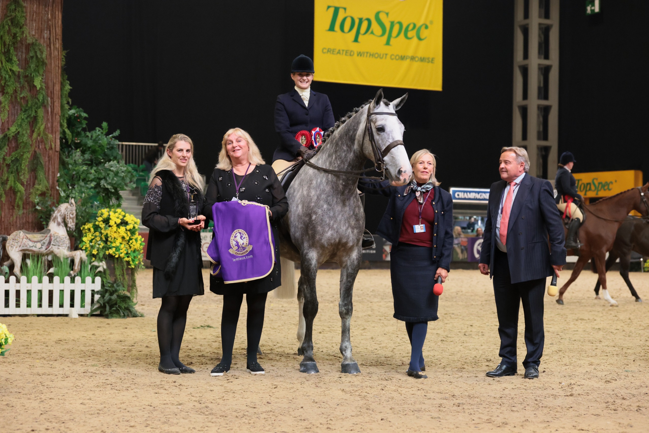 Admiral Augustus and Robyn Carr stand for a photo with the SFAS team