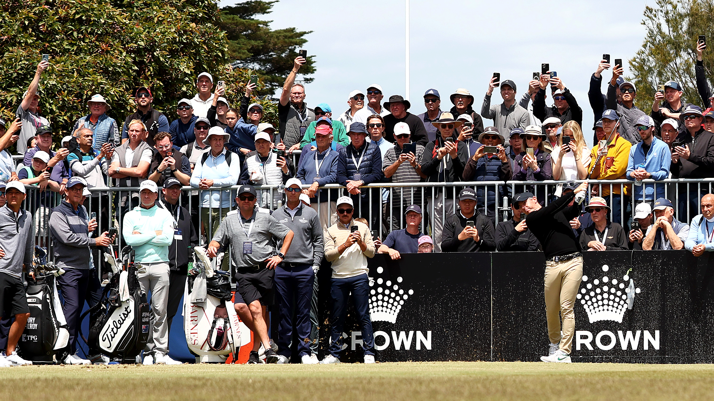 Rory McIlroy hits a tee shot during a practice round ahead of the 2025 Crown Australian Open