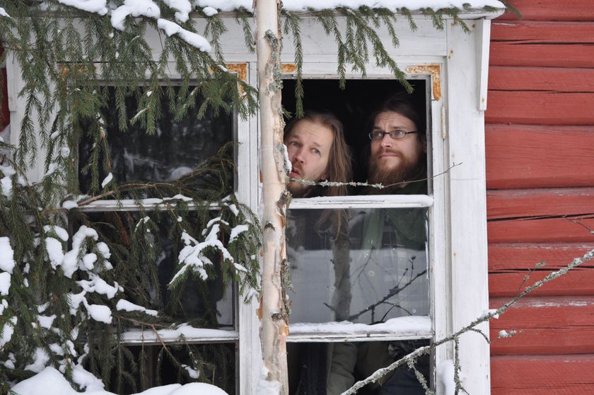Sami and Erkka in a window