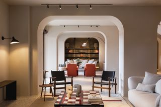 Hotel lobby filled with mid-century modern furniture