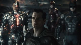 Superman with Cyborg, Flash, and Batman in the background in Zack Snyder's Justice League.