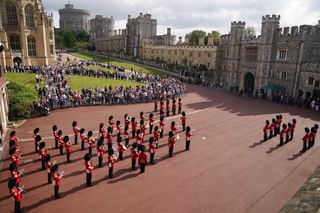 Windsor Castle, the changing of the guard pays tribute to the 20th anniversary of 9/11.