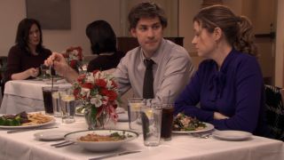 Jim and Pam at a restaurant table in The Office