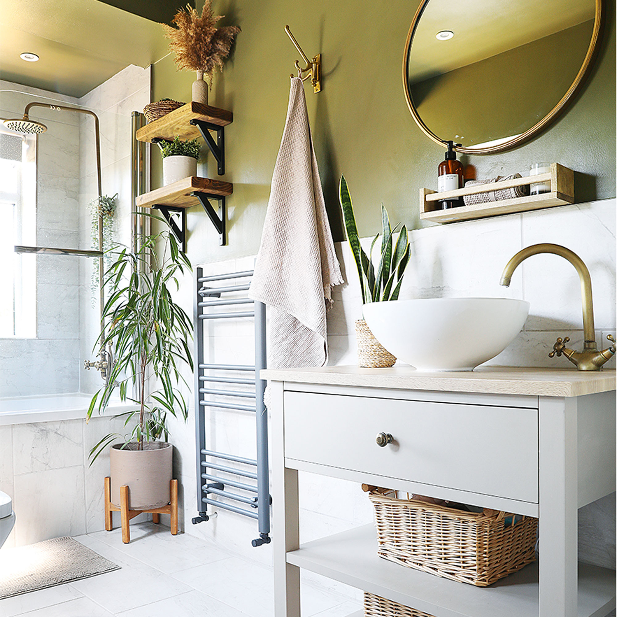 green bathroom with basin and vanity