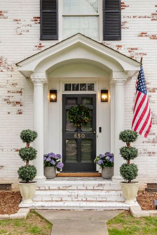 front porch with summer plantings