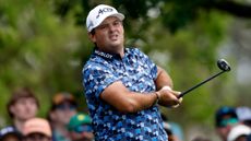 Patrick Reed takes a shot during The Masters