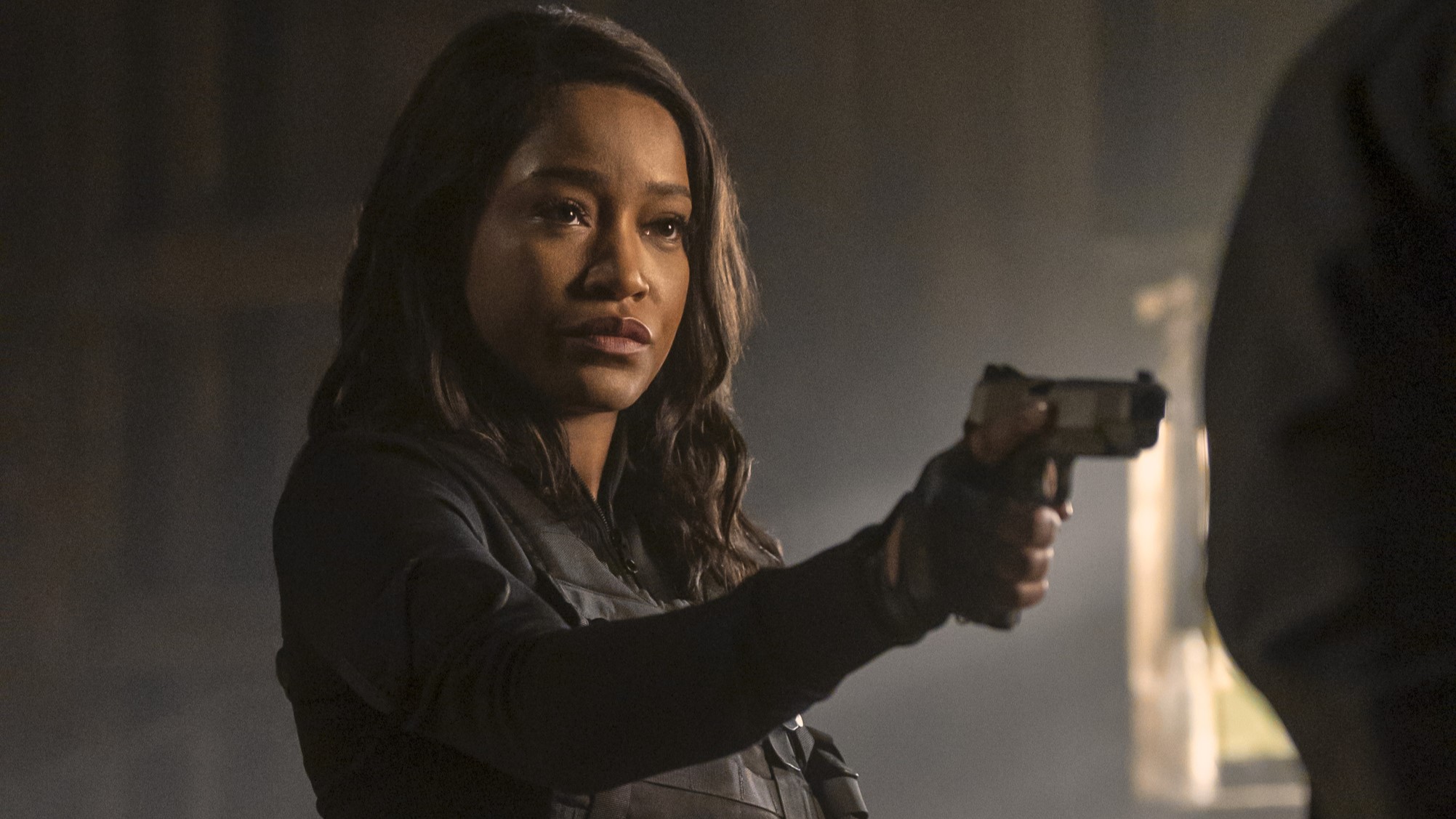 Keke Palmer holding a gun in The Pickup