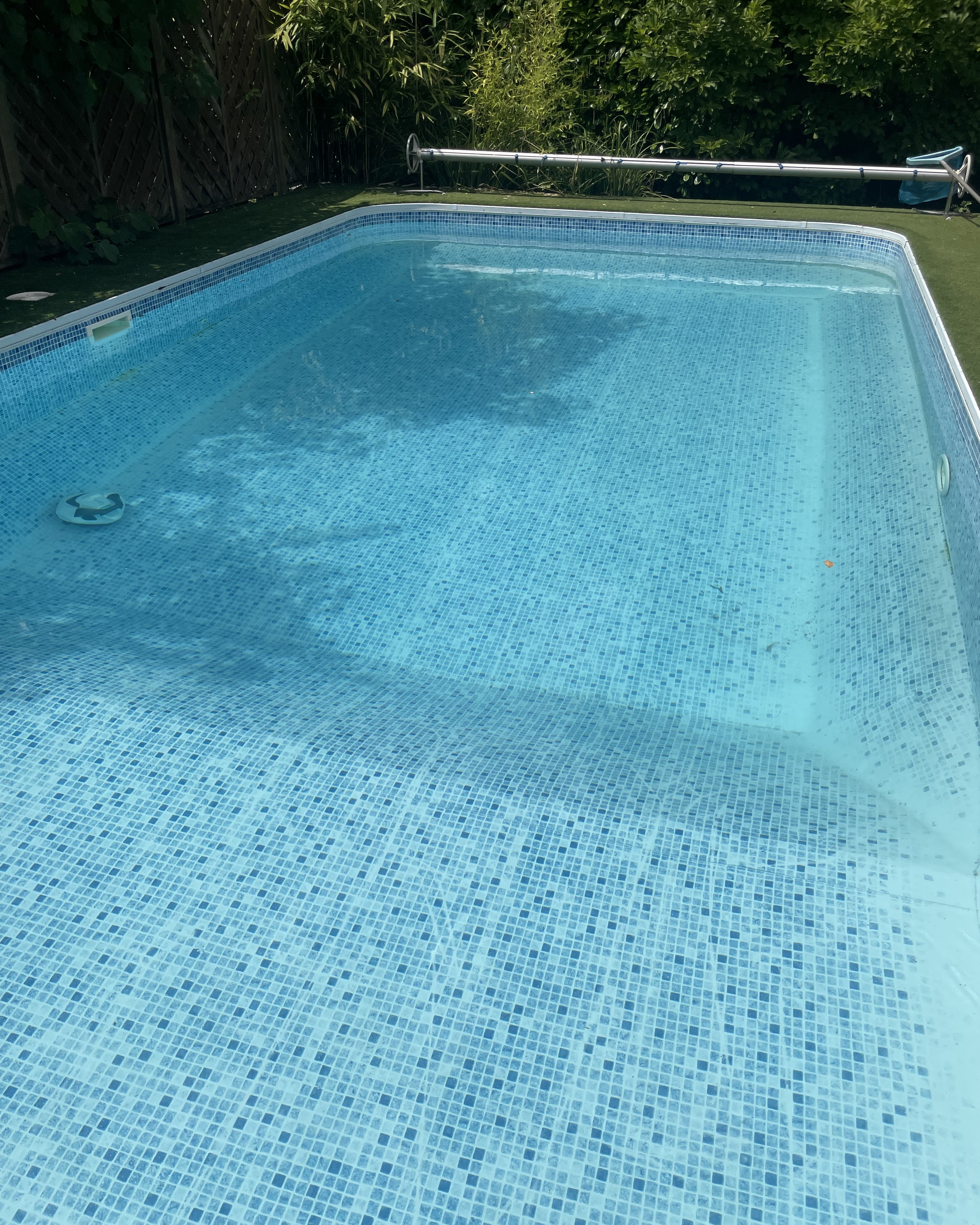 A robot pool cleaner cleaning a pool making it completely clean