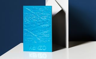 textured invitation, with 3D waves rippling across the vivid blue card