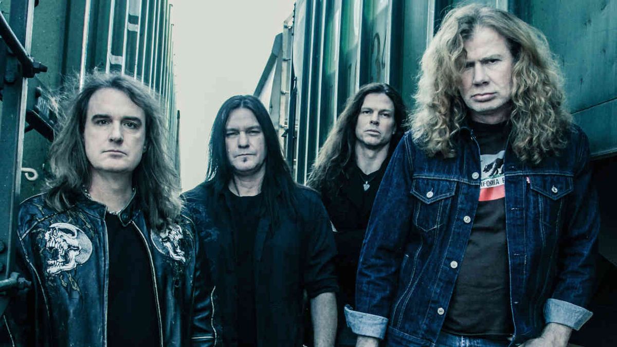 Megadeth posing for a photograph in 2013