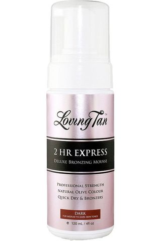 A bottle of Loving Tan 2 Hr Express dark deluxe bronzing mousse against a white background.
