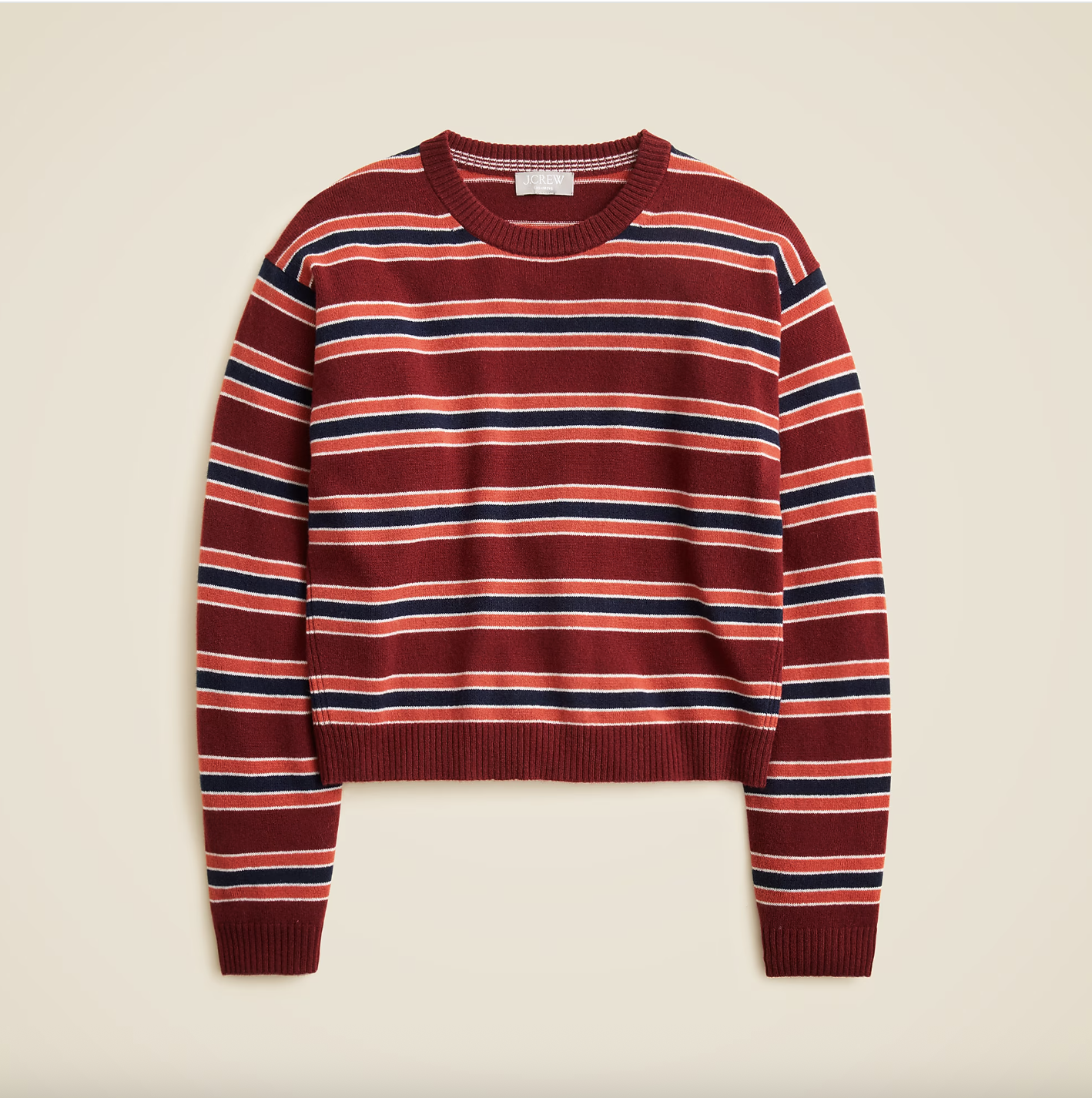 jcrew sweater on a plain backdrop