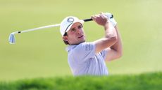 James Nicholas hits an iron shot during the 2025 US Open at Oakmont