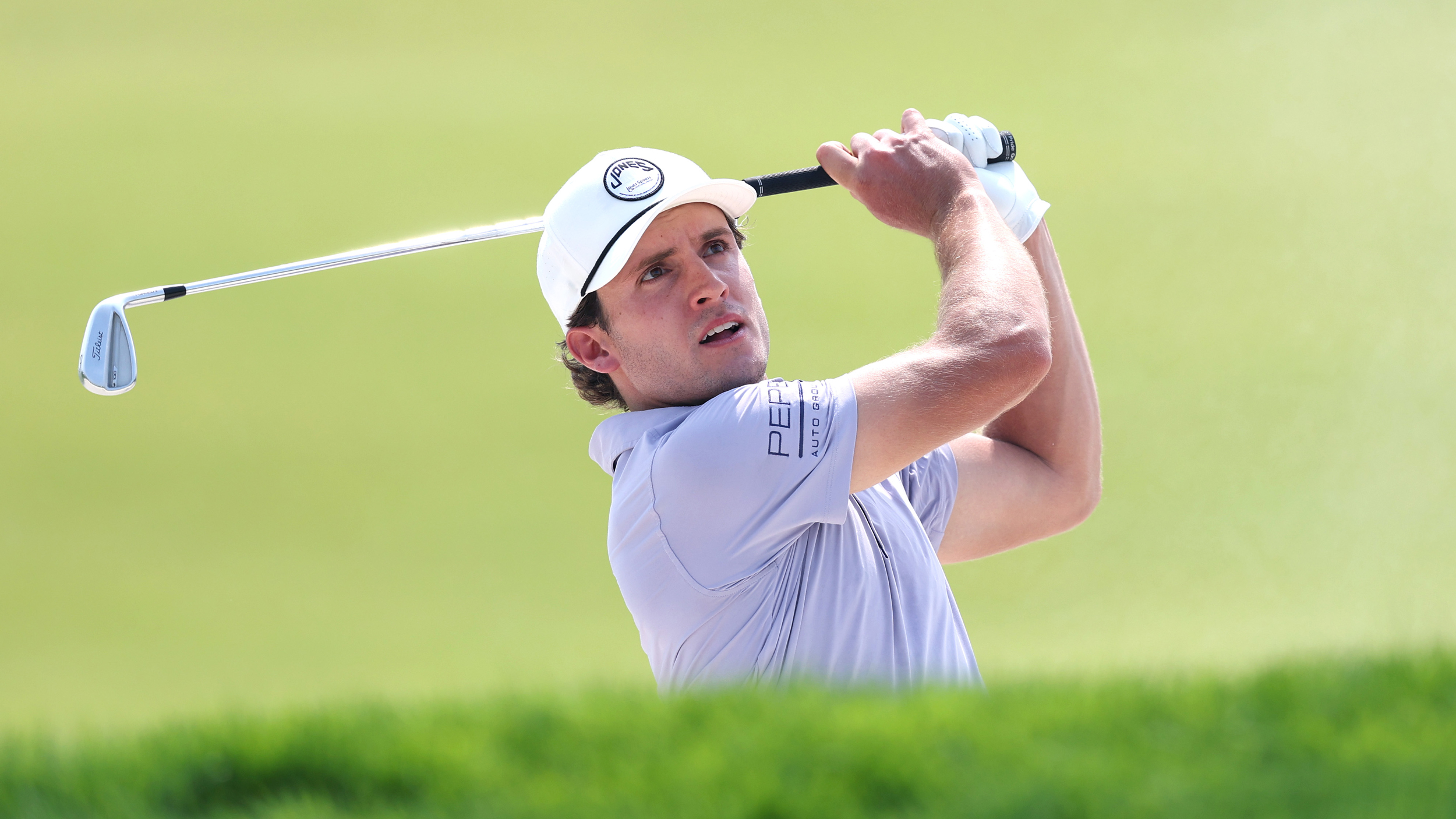James Nicholas hits an iron shot during the 2025 US Open at Oakmont