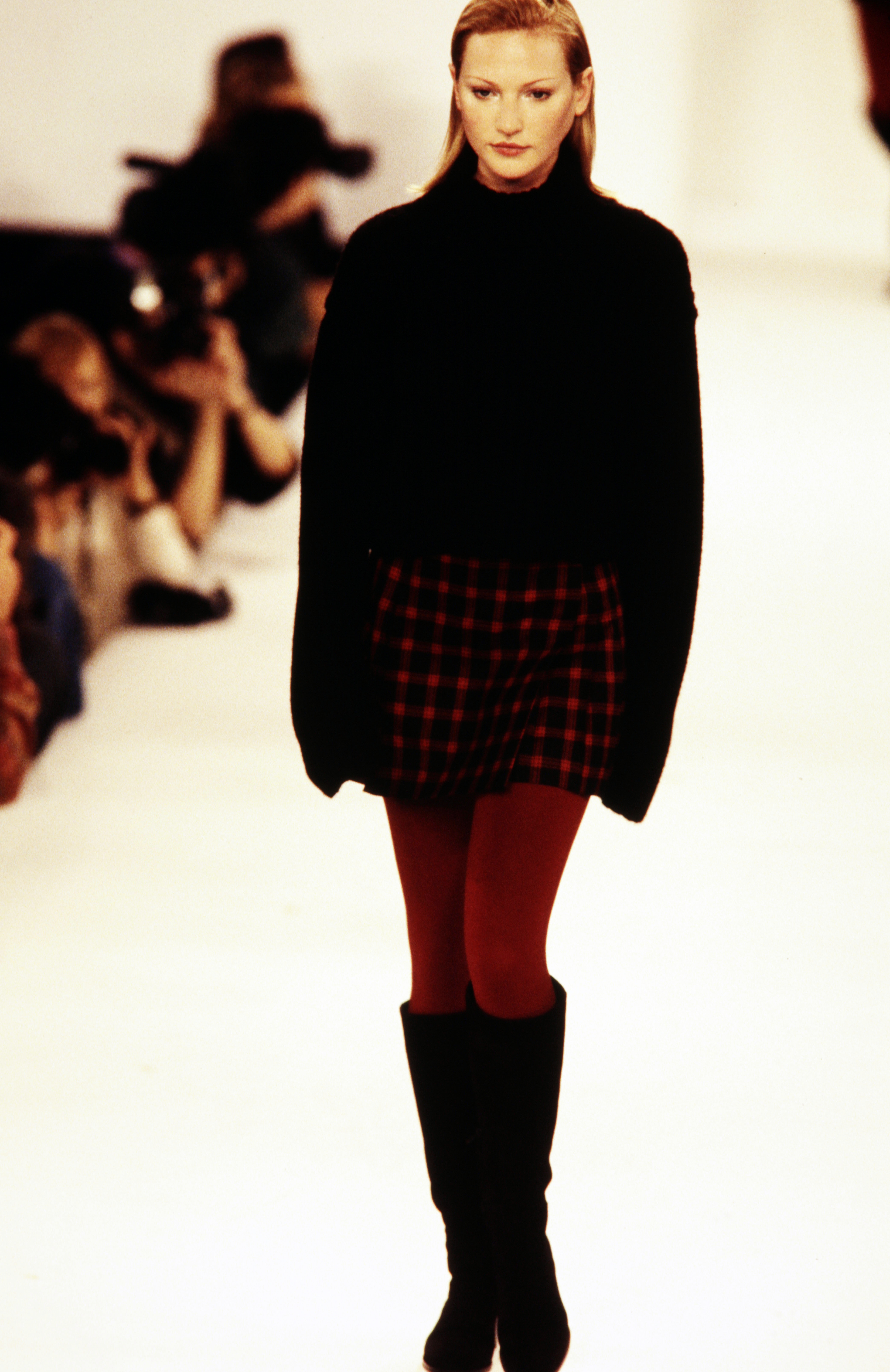 A model walks in the CK Calvin Klein Fall 1994 Ready to Wear Runway Show on April 10, 1994, in New York City.