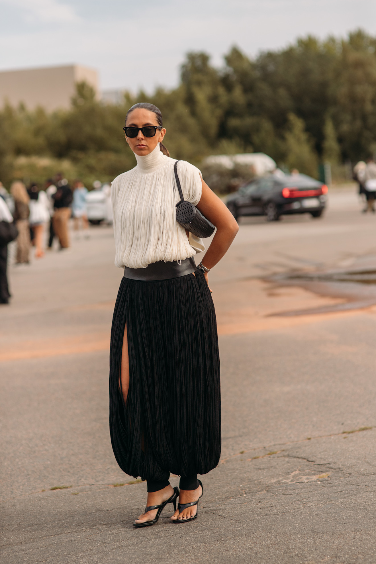 woman wearing a fringe top and pants in Copenahgen