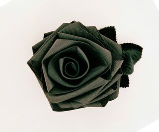 black fabric rose