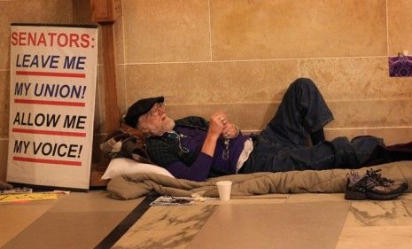 Union members and the Wisconsin state government remain at an standstill as the two sides battle over workers benefits and pay. 