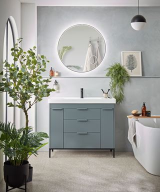 A multi-drawer vanity unit in a bright bathroom