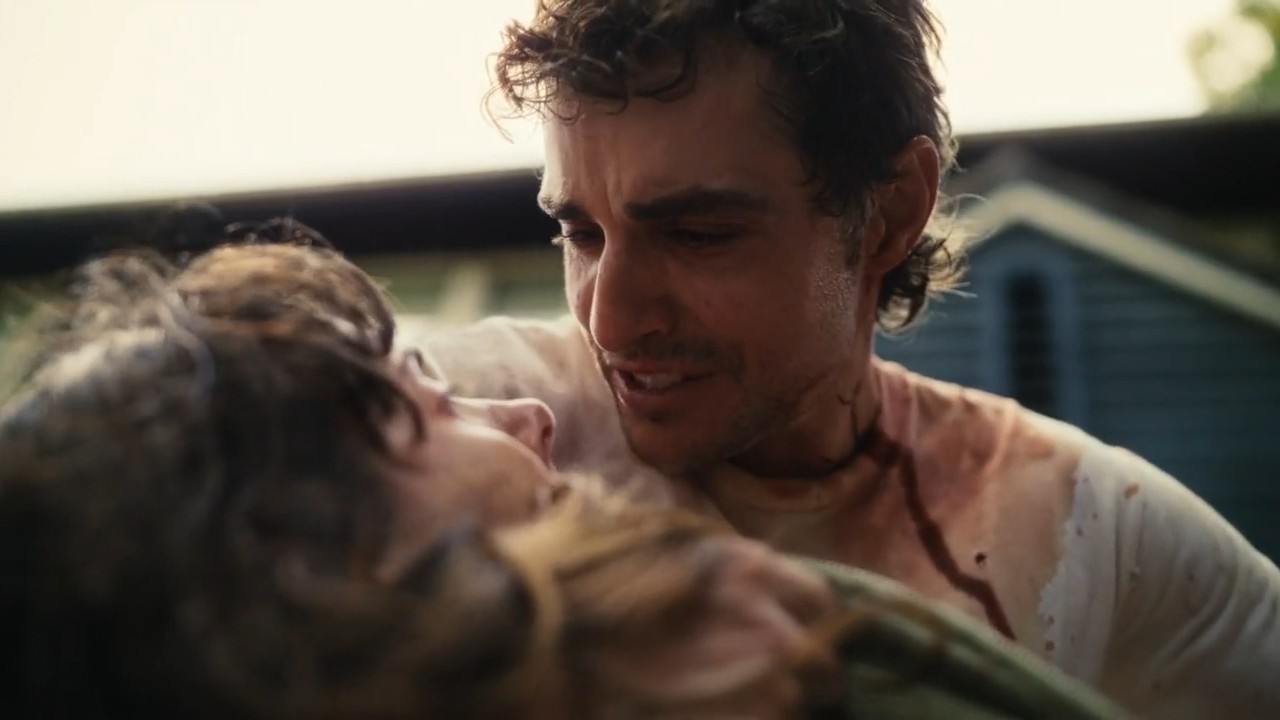 Dave Franco crying over a bleeding Alison Brie in Together.