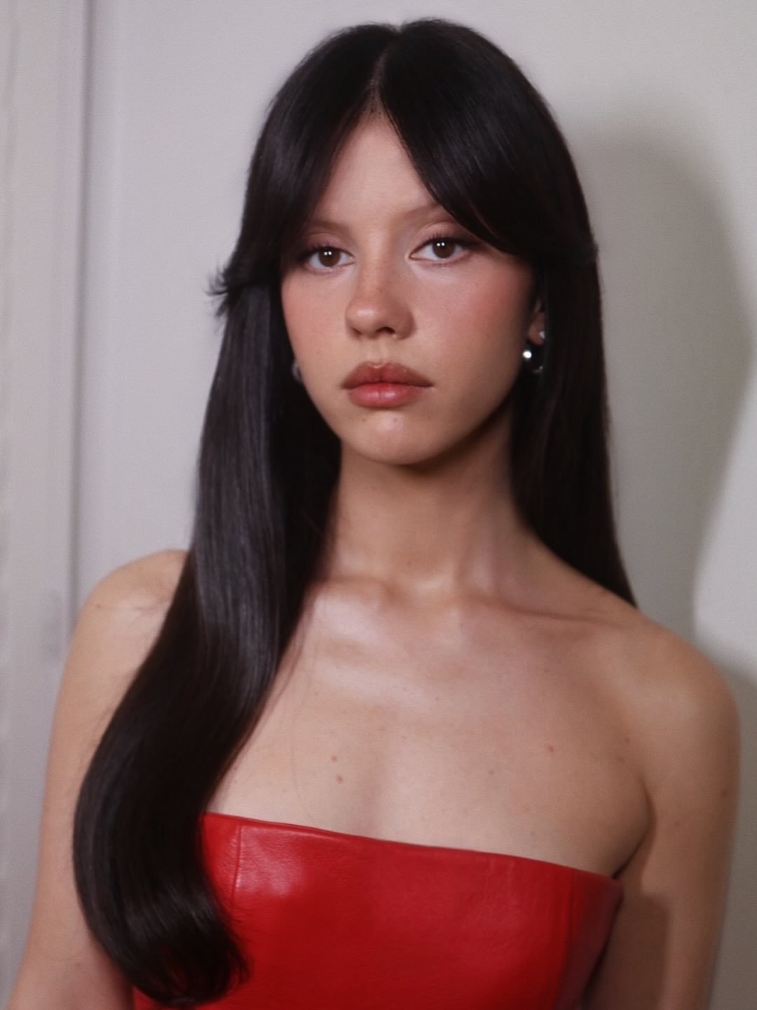 Mia Goth with curtain fringe hairstyle