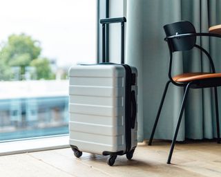 small suitcase and chair