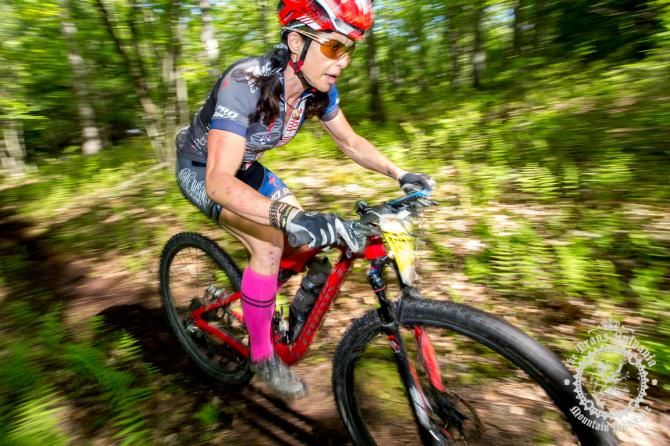 Selene Yeager in a loamy descent as she goes onto win the stage