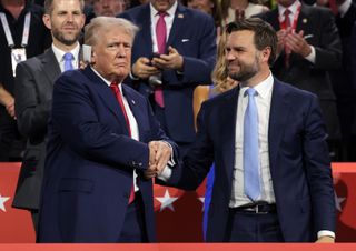 Former US President and Republican presidential candidate Donald Trump (L) and US Senator from Ohio and Republican vice presidential candidate J.D. Vance attend a remembrance ceremony on the 23rd anniversary of the September 11 terror attack on the World Trade Center at Ground Zero, in New York City on September 11, 2024.