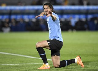 Edinson Cavani celebrates after scoring for Uruguay against Panama in 2022.
