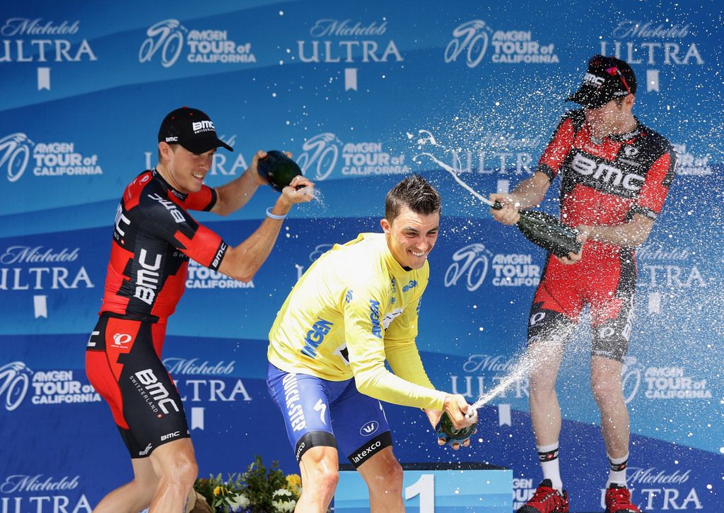 Dennis, Alaphilippe and Bookwalter spray the champagne