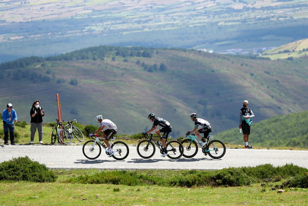 ESPINOSA DE LOS MONTEROS SPAIN AUGUST 05 LR Geoffrey Bouchard of France and AG2R Citren Team Romain Bardet of France and Team DSM Mikel Nieve Ituralde of Spain and Team BikeExchange passing through Picon Blanco Hill 1512m in the Breakaway during the 43rd Vuelta a Burgos 2021 Stage 3 a 173km stage from Busto de Bureba to Espinosa de los Monteros VueltaBurgos BurgosCycling CapitalMundialdelCiclismo on August 05 2021 in Espinosa de Los Monteros Spain Photo by Gonzalo Arroyo MorenoGetty Images