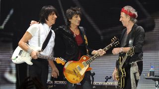 Jeff Beck (left) onstage with Ronnie Wood and Keith Richards
