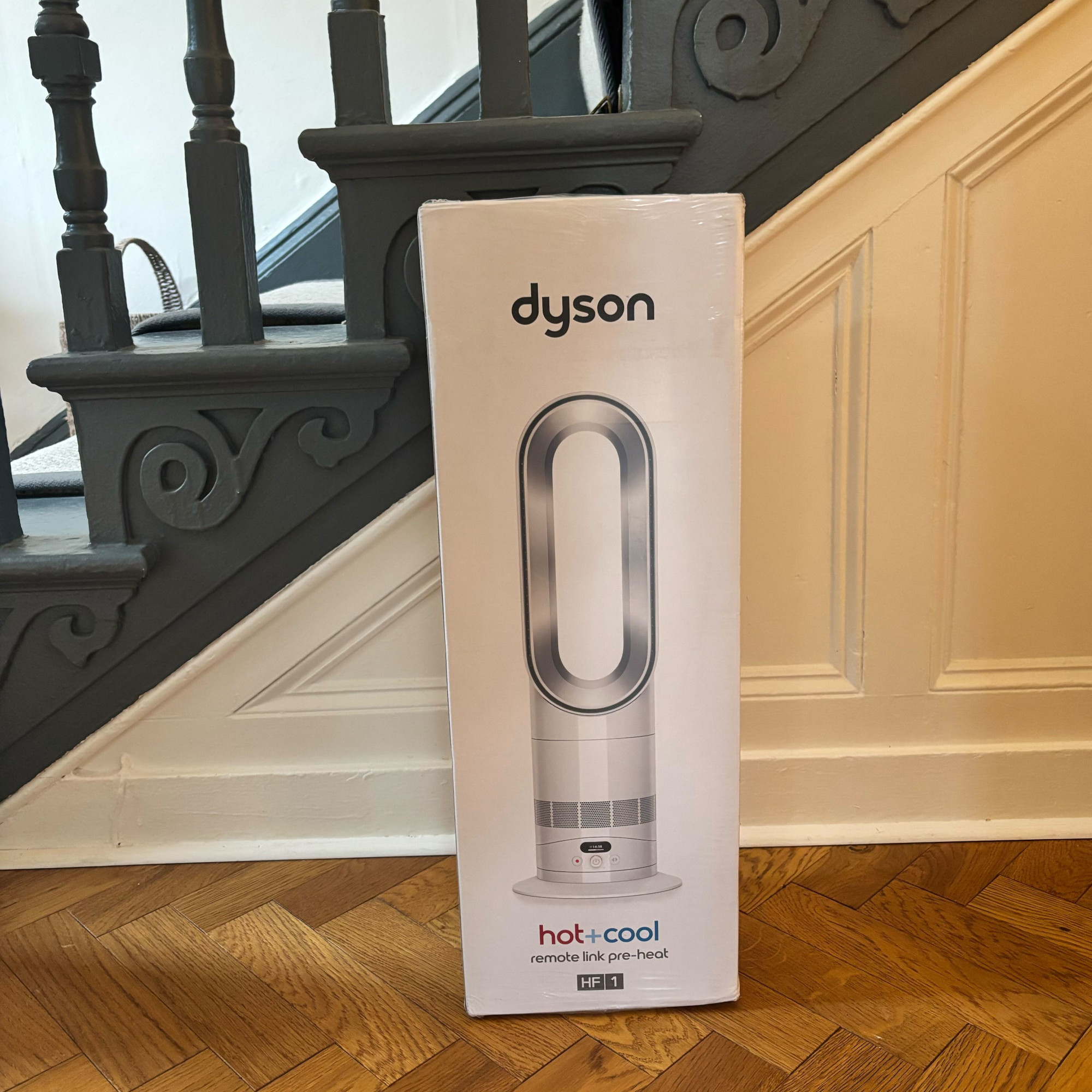 dyson hotcool pre heat heater and cooling fan in a hallway