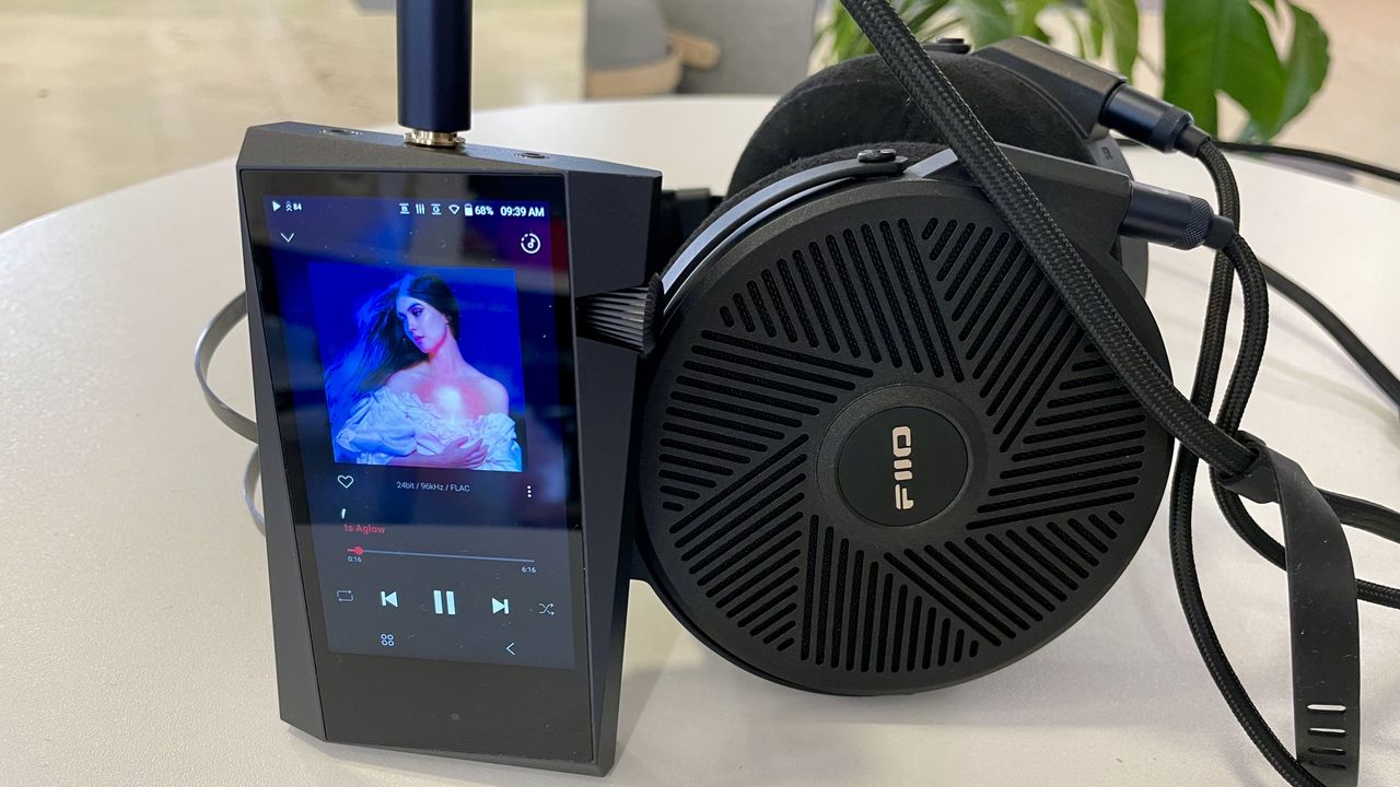 Astell &amp; Kern A&amp;norma SR35 and FiiO FT5 on a table