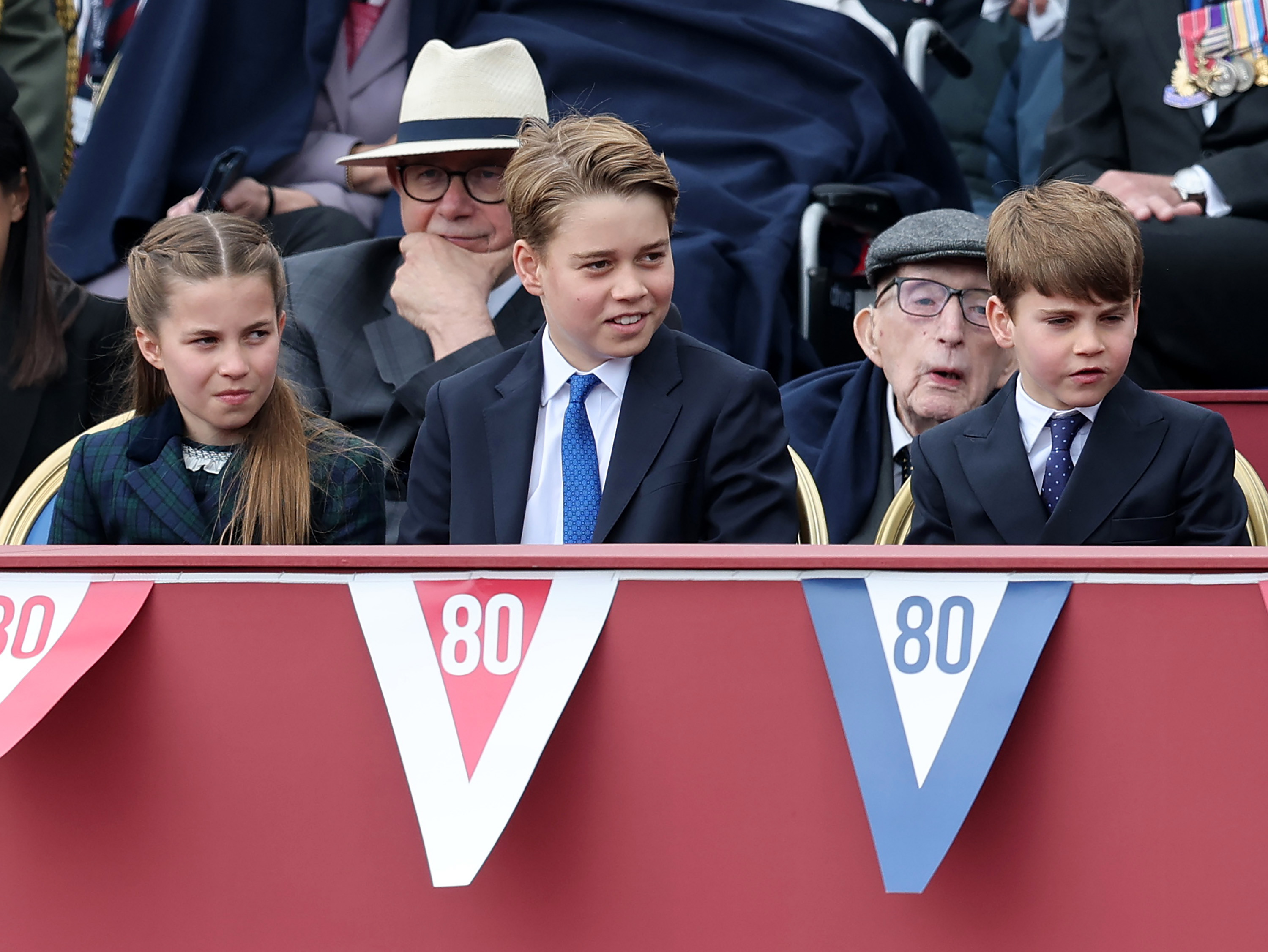 Princess Charlotte, Prince George, Prince Louis sitting at the VE Day parade May 5, 2025