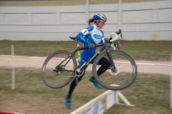 Katerina Nash shows great form as she flies over the barriers