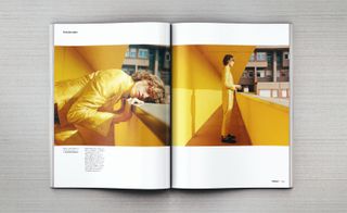 An open magazine spread. Left page-: A model in yellow resting their head on a yellow balcony photographed against a yellow background. Right page: A model in Yellow standing on a yellow balcony