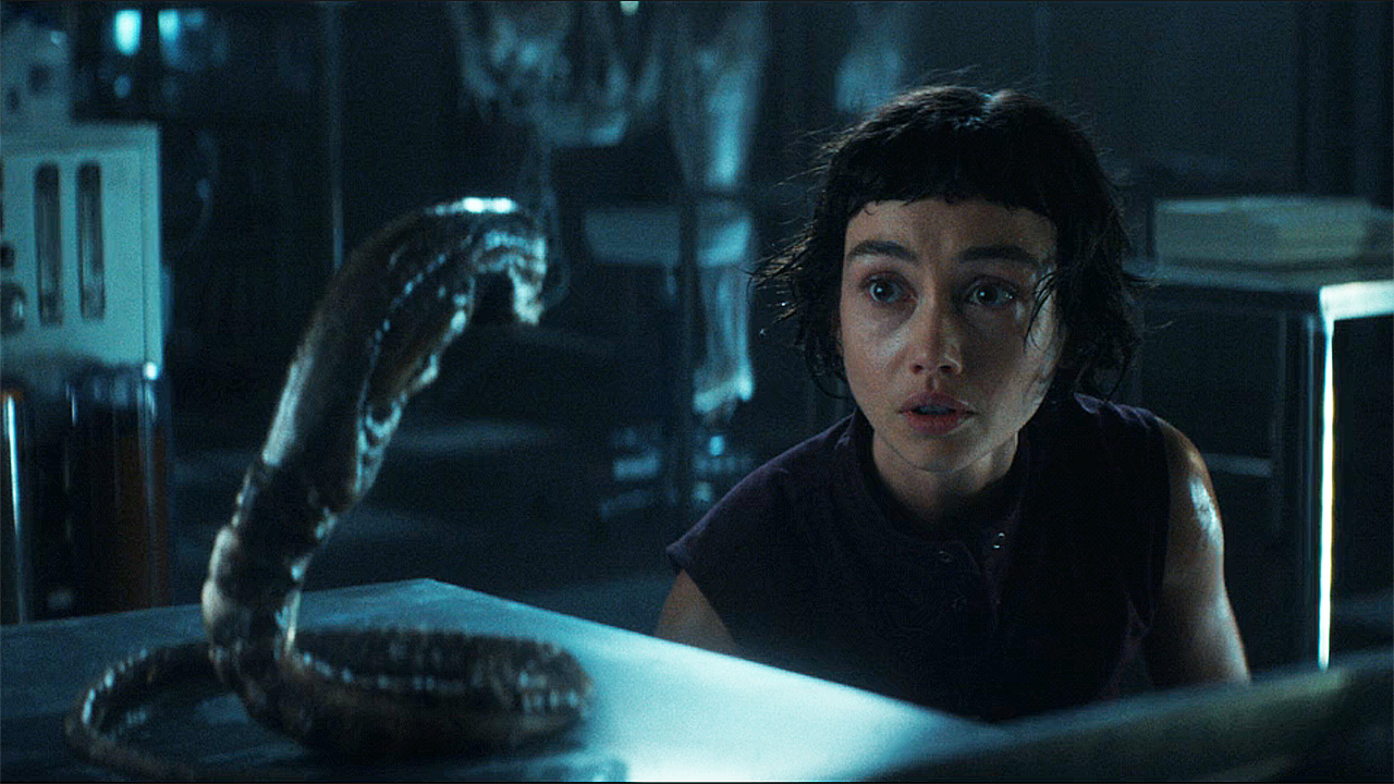 Wendy looking at a baby xenomorph in Alien: Earth episode 4