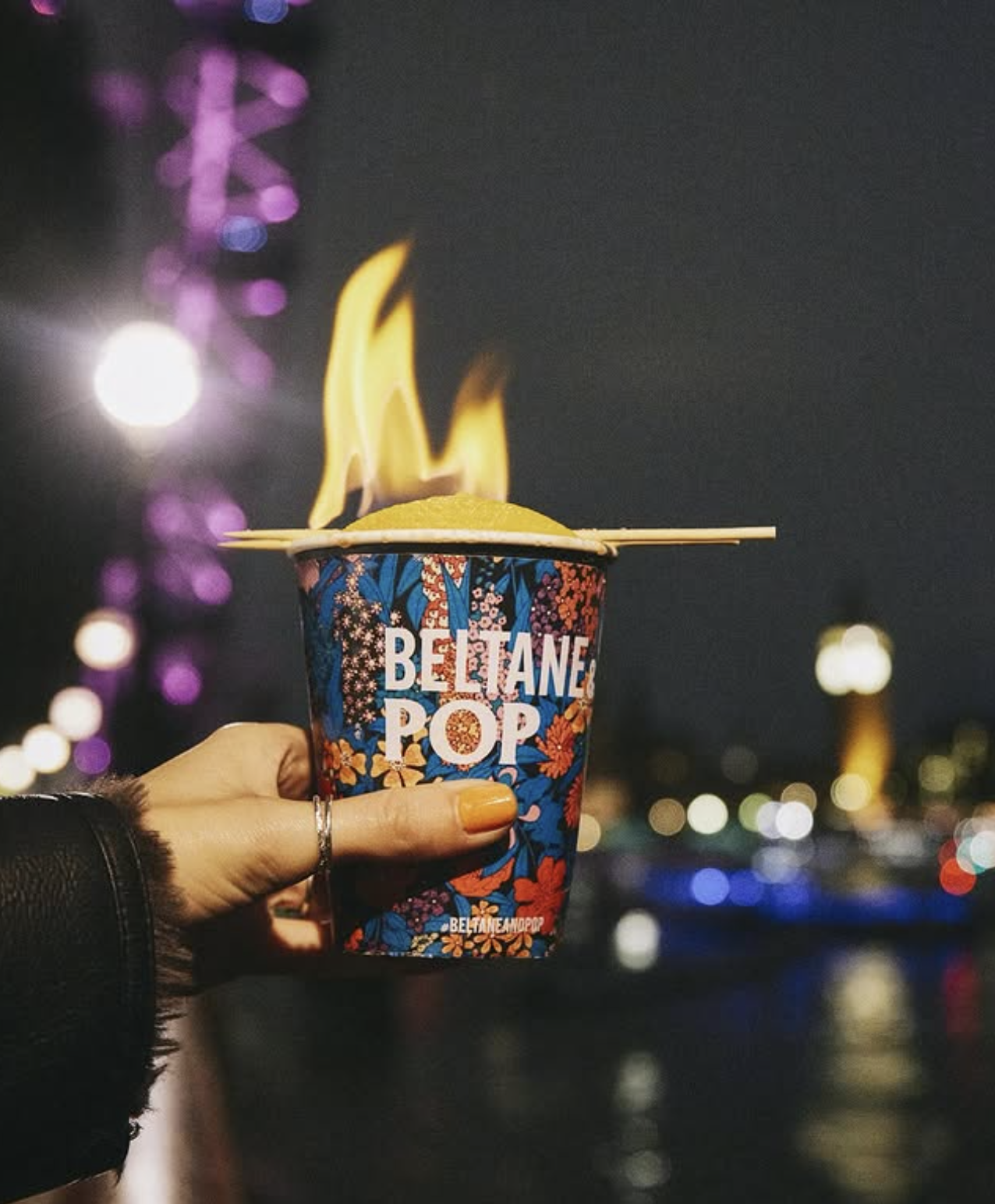 an image of the flaming feuerzangenbowle being held in front of London&#039;s southbank