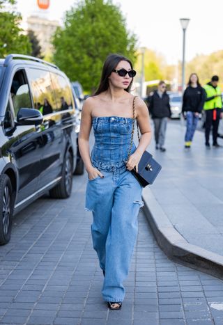 woman wearing denim tube top and jeans