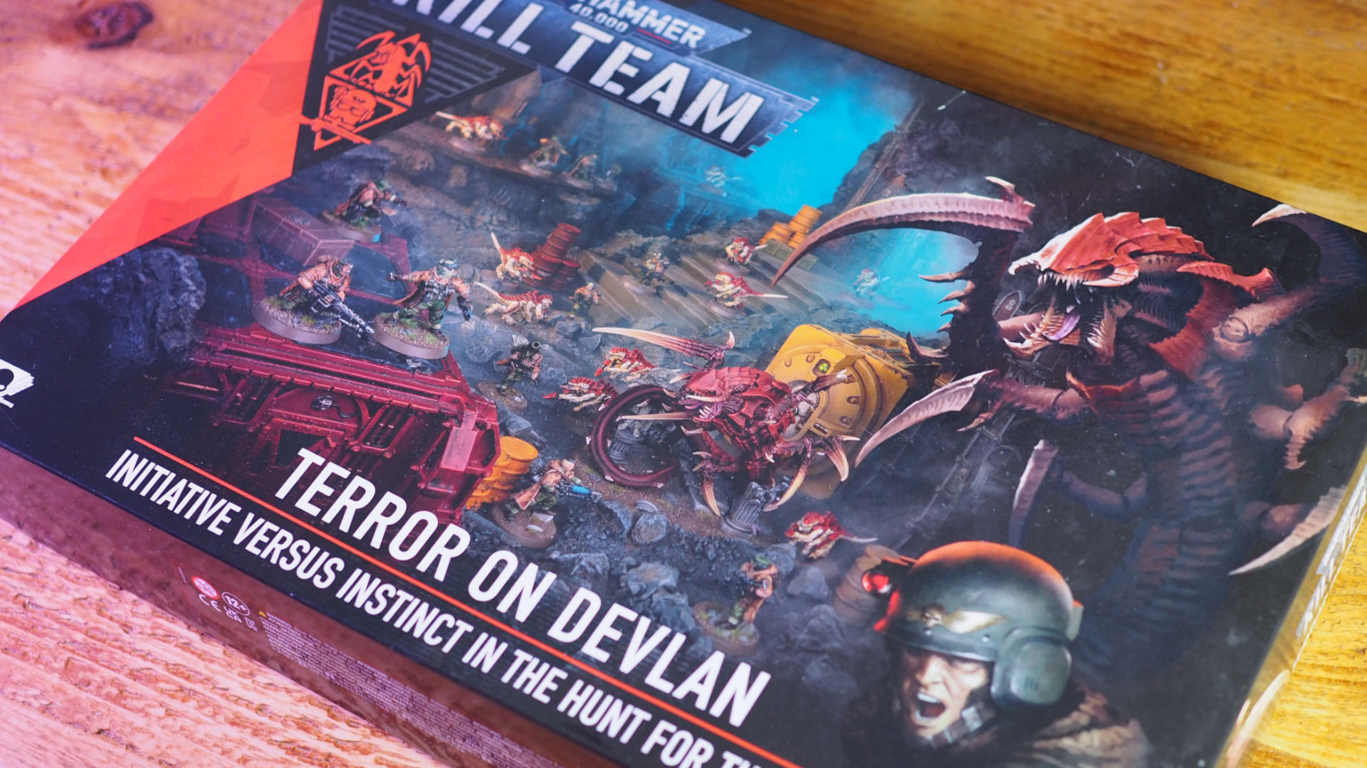 Kill Team: Terror on Devlan box on a wooden surface