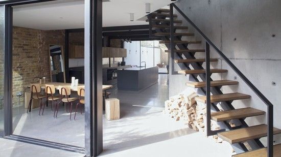 staircase with dining table and glass window