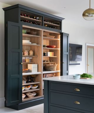 Black cabinet with wine storage, wooden inside and shelves with panel lights