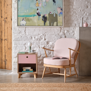 pink Bisley chair in playroom with pink drawer.