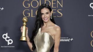 BEVERLY HILLS, CALIFORNIA - JANUARY 05: Demi Moore, winner of the Female Actor in a Motion Picture Musical or Comedy Award for "The Substance" poses in the press room at the 82nd Annual Golden Globe Awards at The Beverly Hilton on January 05, 2025 in Beverly Hills, California.