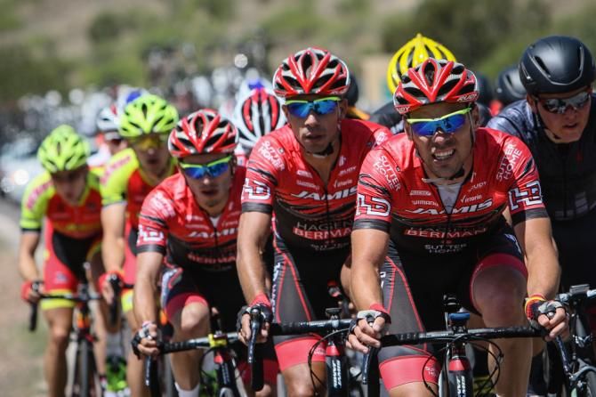 Jamis brings its riders to the front as they approach the climb