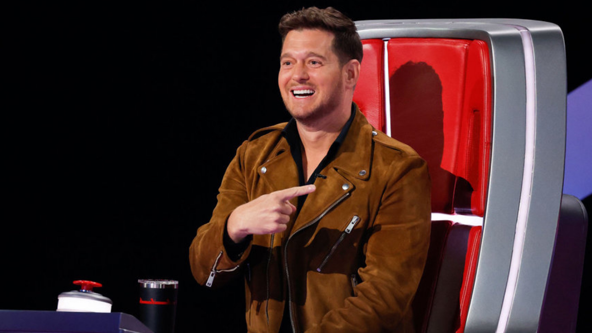 Michael Buble is shown on The Voice.