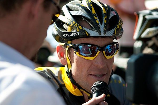 Lance is interviewed before the start.